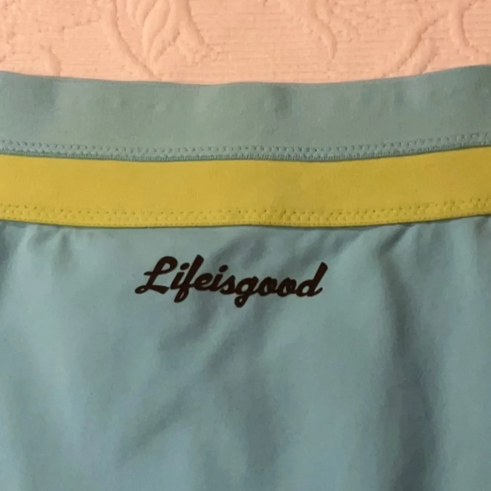 Life Is Good Aqua and Lime Mini Skort. Small. Athletic
